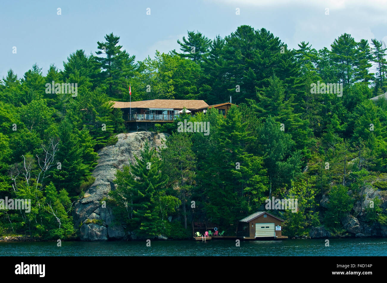 Canada, Ontario, Muskoka. Cottage and boathouse. Credit as Mike