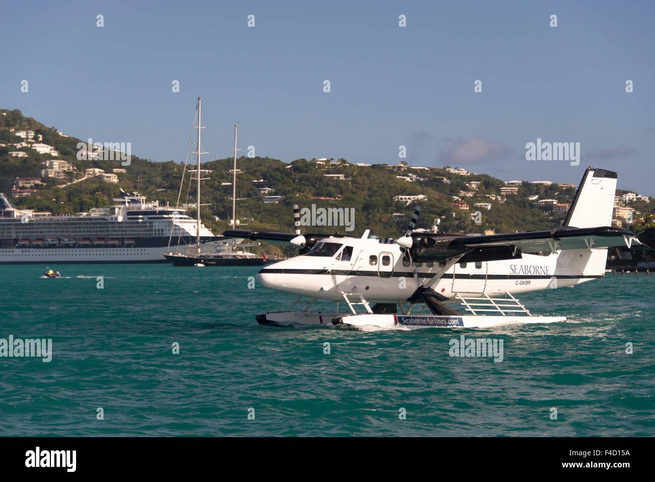 USVI, St Thomas, Charlotte Amalie. Seaplane lands near ferry terminal Stock Photo