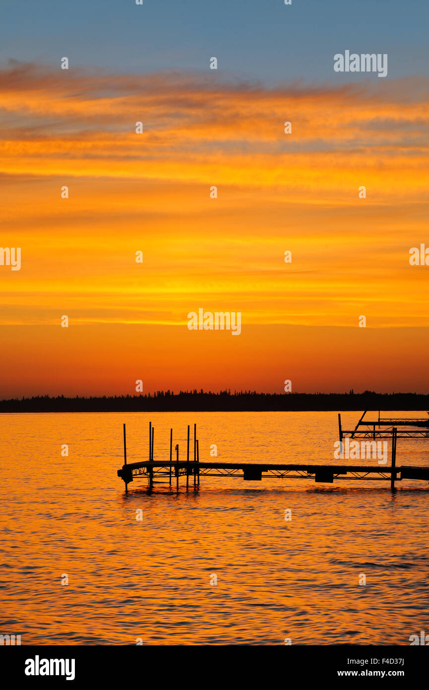 Canada, Manitoba, Clearwater Lake Provincial Park. Docks on Clearwater Lake at sunrise. Credit as: Mike Grandmaison / Jaynes Gallery / DanitaDelimont.com Stock Photo