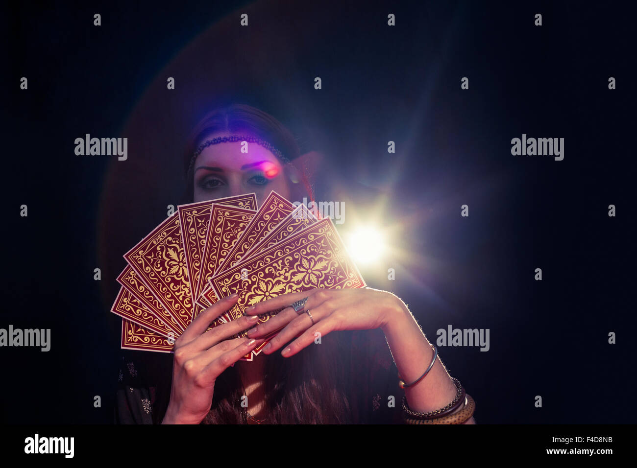 Fortune teller holding tarot cards Stock Photo Alamy