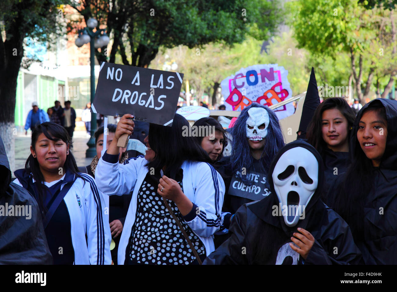 La Paz, Bolivia, 16th October 2015. A student carries a placard saying 'No to Drugs' during a march through La Paz city centre warning of the dangers of drug use. The demonstration is organised every year by the police together with schools and colleges to educate and raise awareness about drugs and their dangers. Credit: James Brunker / Alamy Live News Stock Photo