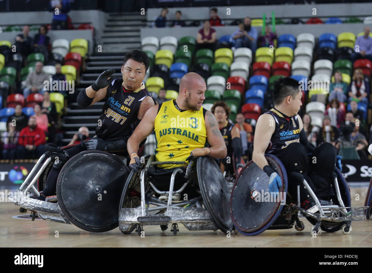 London, UK. 16th October, 2015. World Wheelchair Rugby Challenge Team Aus beat Japan 60-55 to win Bronze medal. Copperbox, Olympic Park, London, Aus Batt is tackled by Japan's Yukinobu. UK. 16th October, 2015. copyright carol moir/Alamy Live News Stock Photo