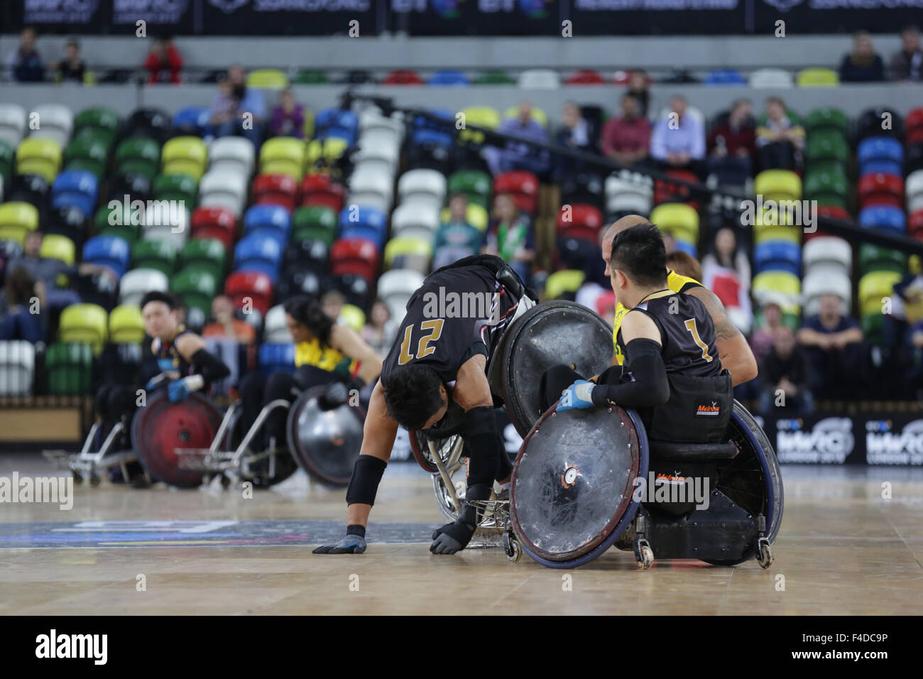 London, UK. 16th October, 2015. World Wheelchair Rugby Challenge Team Aus beat Japan 60-55 to win Bronze medal. Copperbox, Olympic Park, London, UK. Yukinobu takes a tumble. 16th October, 2015. copyright carol moir/Alamy Live News Stock Photo