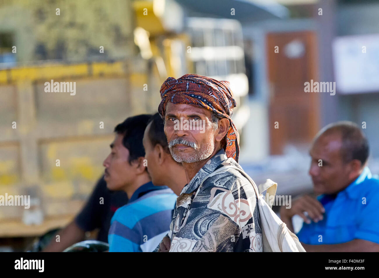 Liquica, East Timor - June 25, 2012:  Traditional leader attending an electoral rally in East Timor 2012 elections Stock Photo