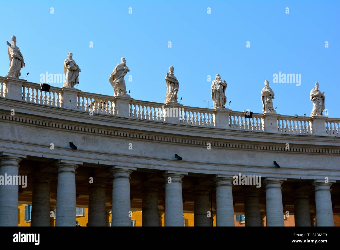 Statues on the top of st peters basilica hires stock photography and