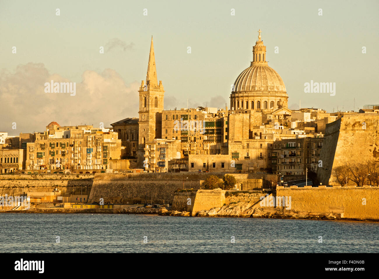 Valletta, Malta, skyline with the dome of the Carmelite Sisters church, St. Paul's Anglican Cathedral spire, and St. Andrew's Bastion (Large format sizes available). Stock Photo