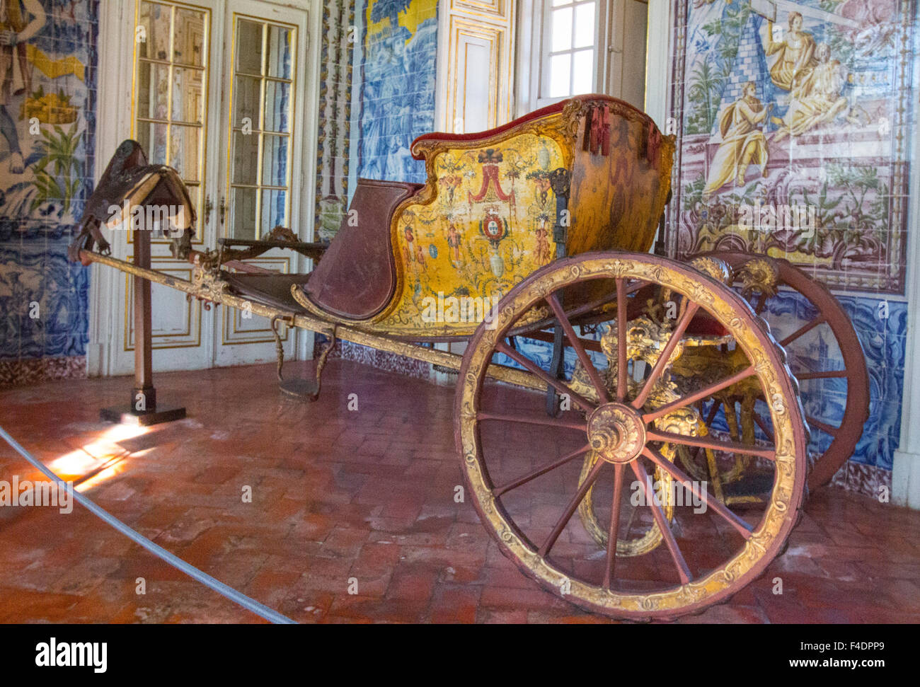 A shot of the royal carriage of King Dom Pedro de Braganza with the saddle used on the horse that pulled the carriage. Stock Photo