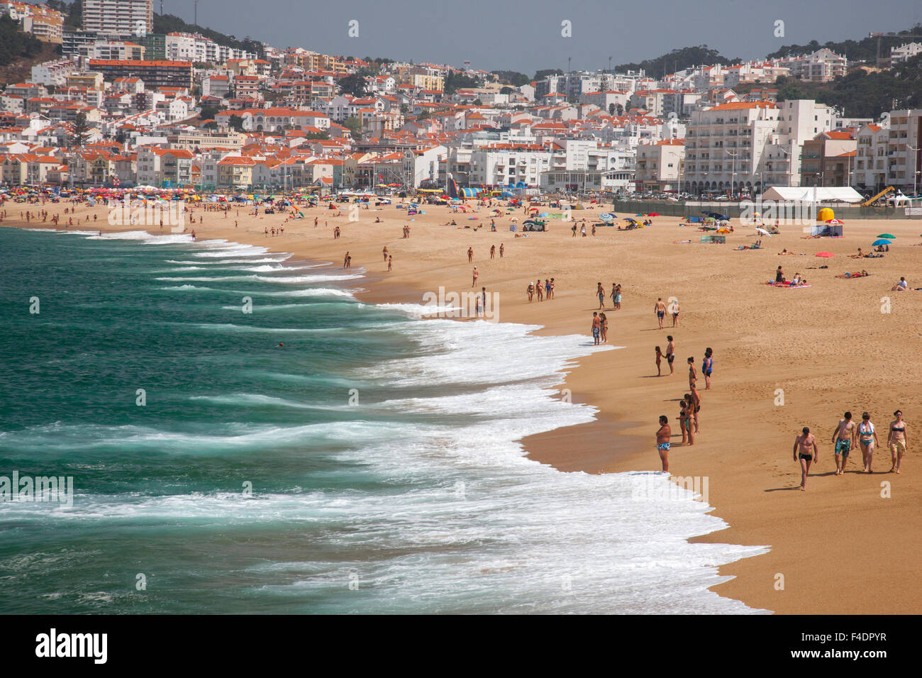 Public beach in the resort town of Nazare on the Portuguese coast Stock Photo