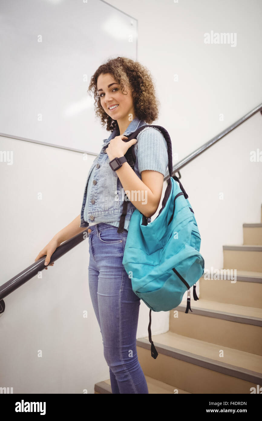 Pretty student on the stairs Stock Photo