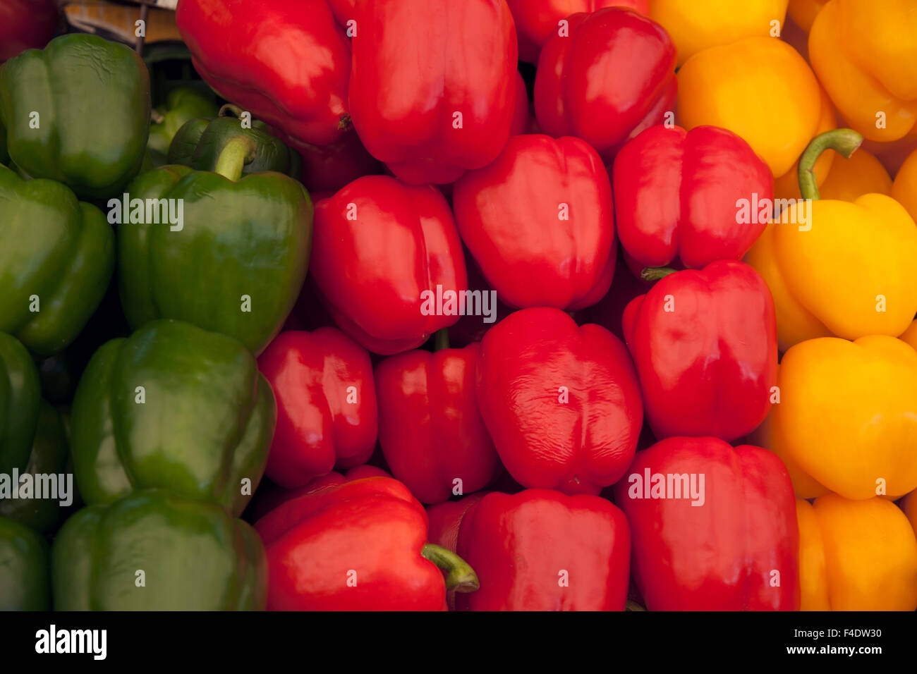 Red, Green and Yellow Pepper Background on Market Stall Stock Photo - Alamy
