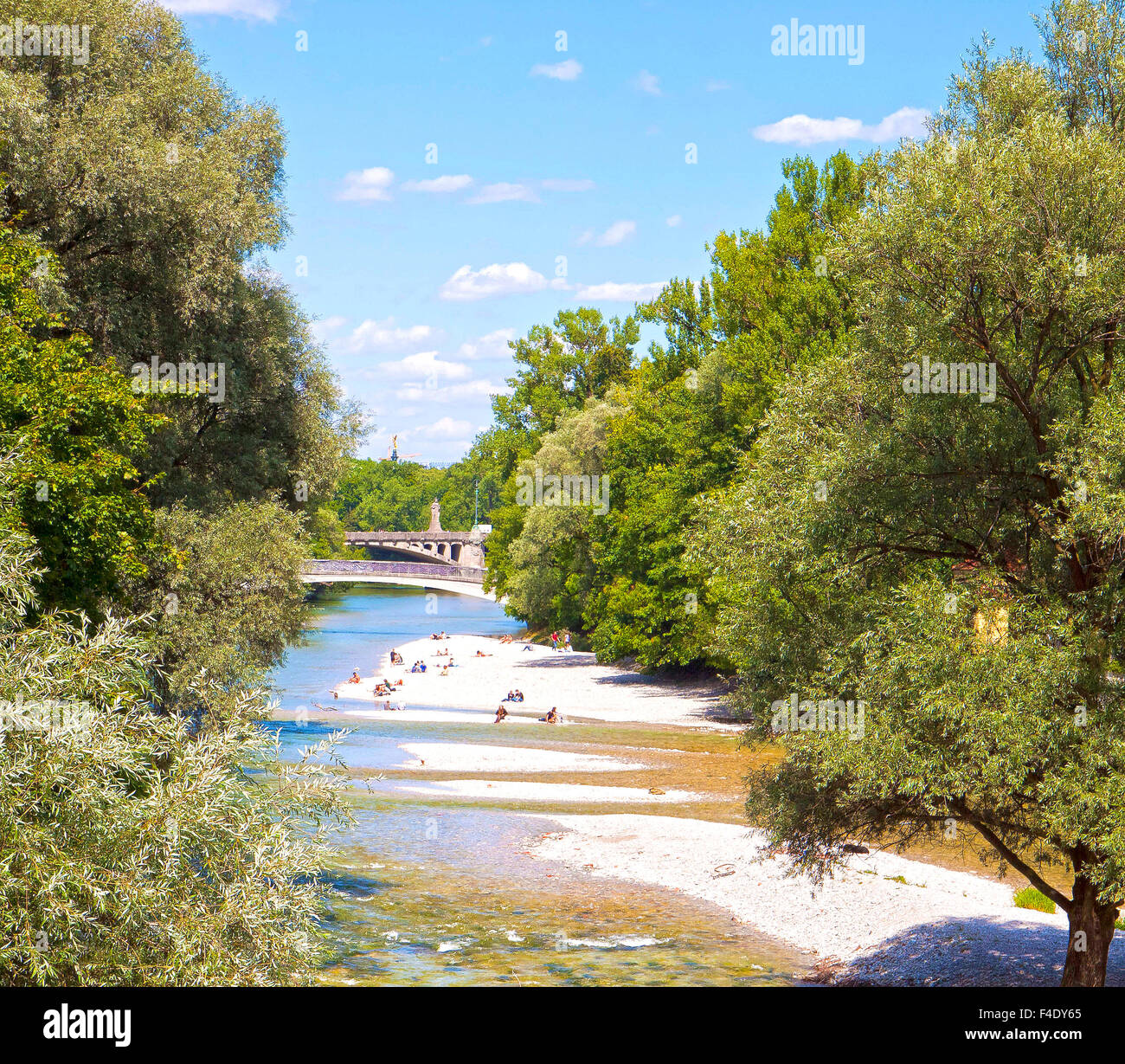 MUNICH, GERMANY Panoramic view of Isar river in Munich. People enjoy the sun and weather on the  river banks Stock Photo