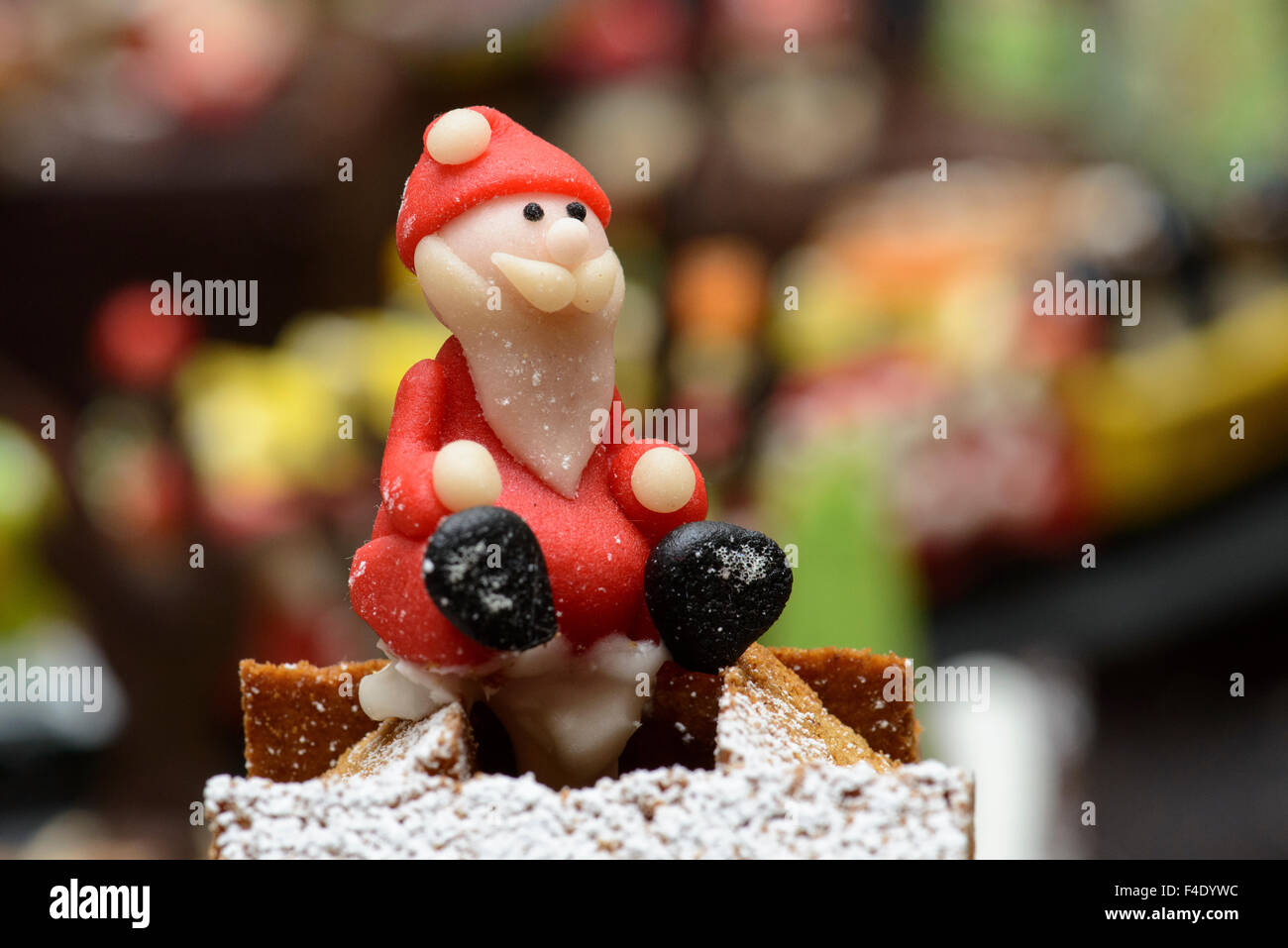 Marzipan Santa, in gingerbread village. (Large format sizes available