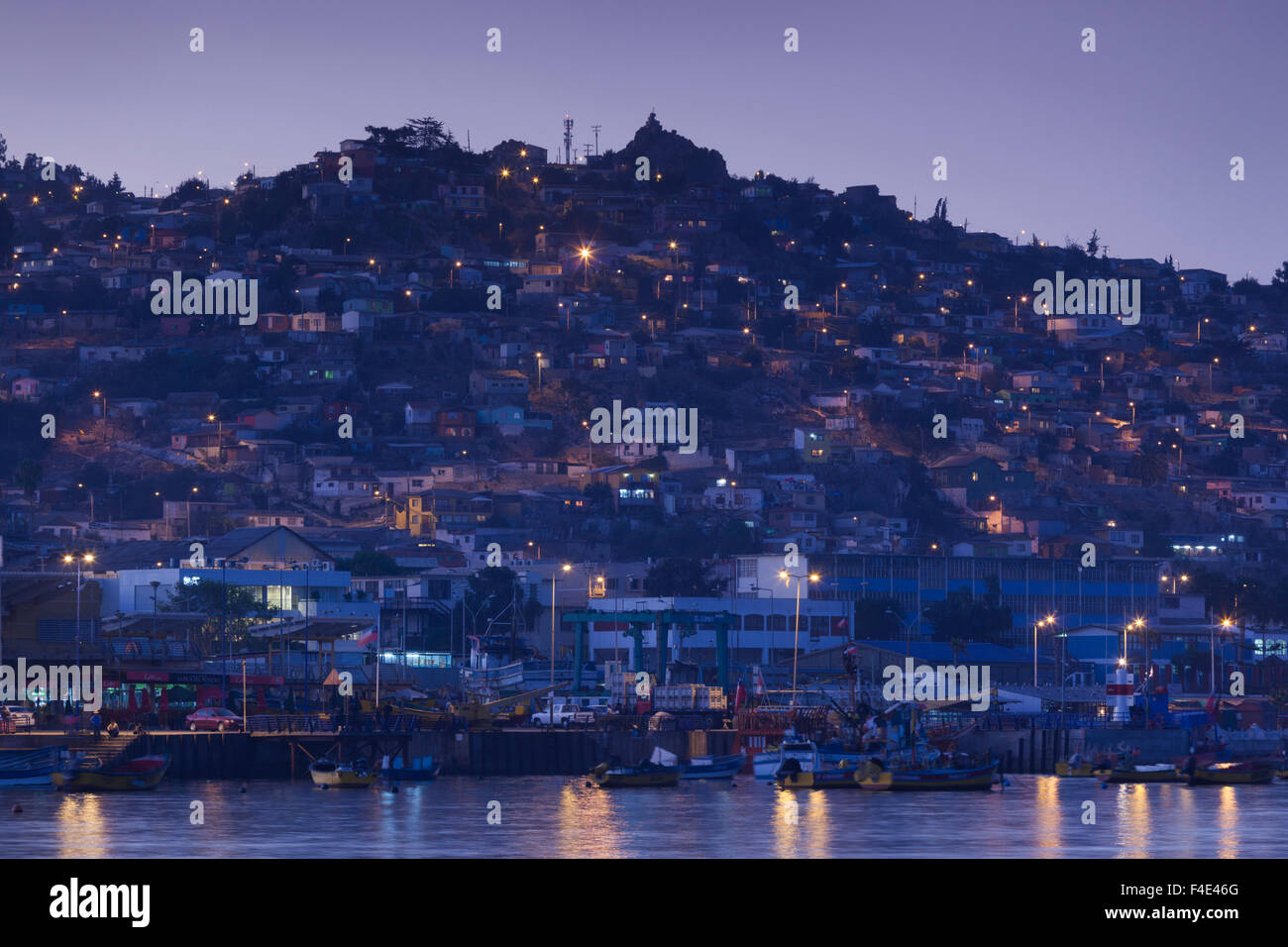 Chile, Coquimbo, city view with the Cruz del III Milenio cross at dusk. Stock Photo