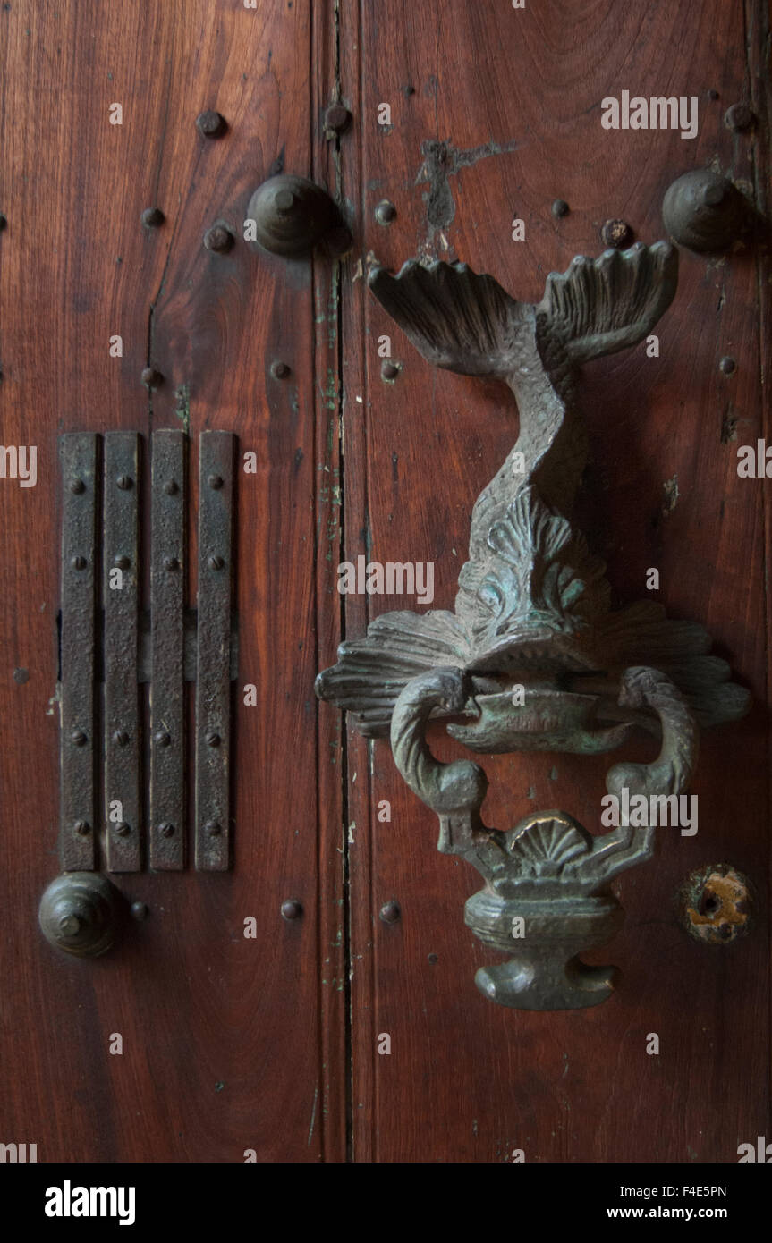 Door Knockers. The old city has ornately carved heavy wooden doors with