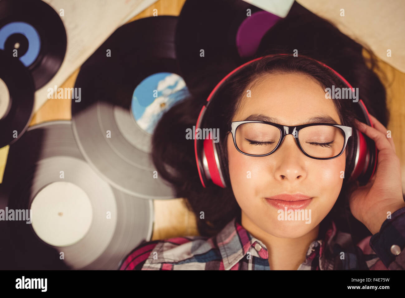 Gorgeous smiling hipster listen music Stock Photo