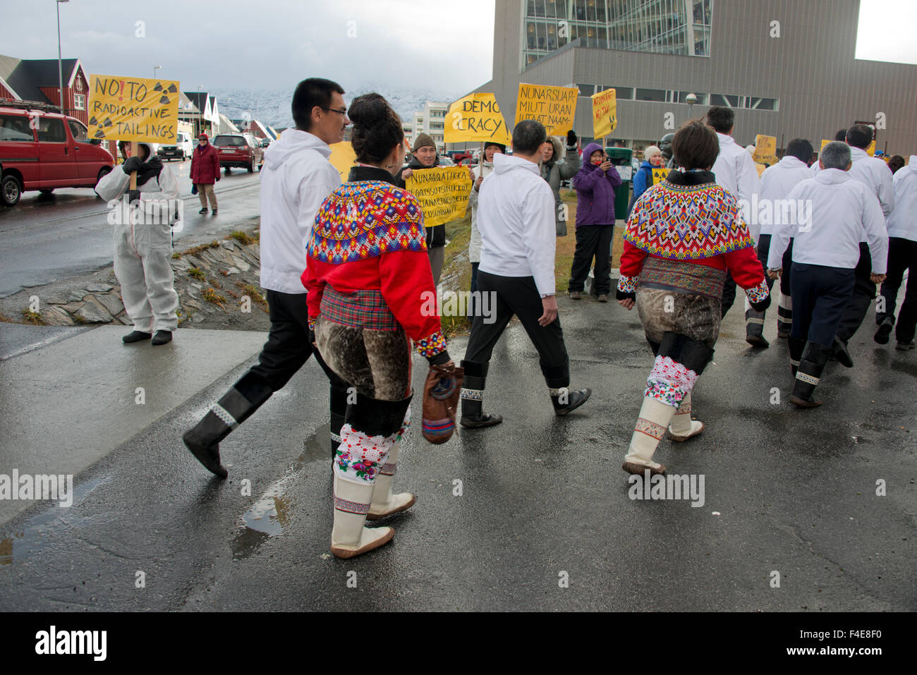 Greenland, Nuuk (aka Godthab). Protestors demonstrating in front of parliament (in traditional attire) against nuclear testing on Greenland's ice sheet. (Large format sizes available) Stock Photo