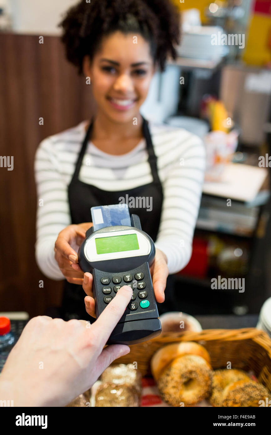 Customer paying with credit card Stock Photo Alamy