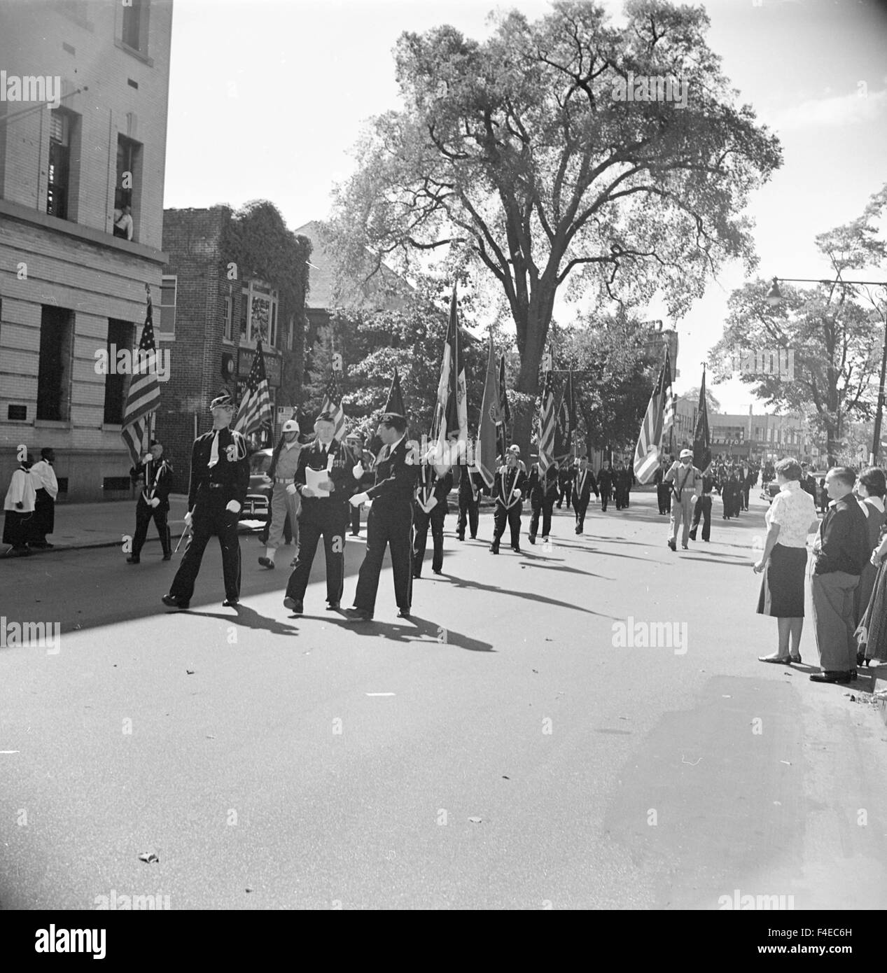 veterans marching in a parade Stock Photo Alamy