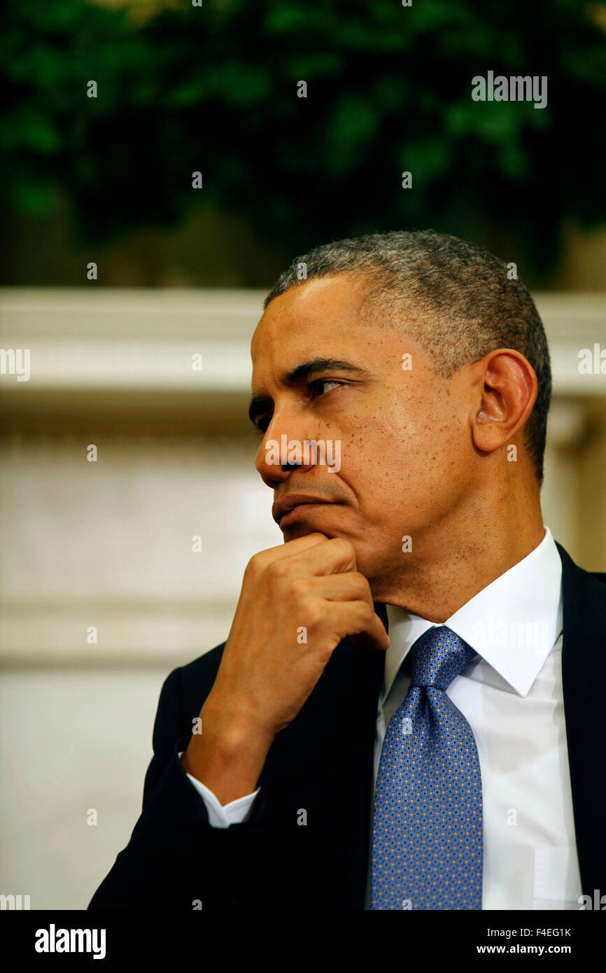 President Barack Obama listens to Prime Minister Nawaz Sharif of Pakistan in the Oval Office on October 23, 2013. Stock Photo