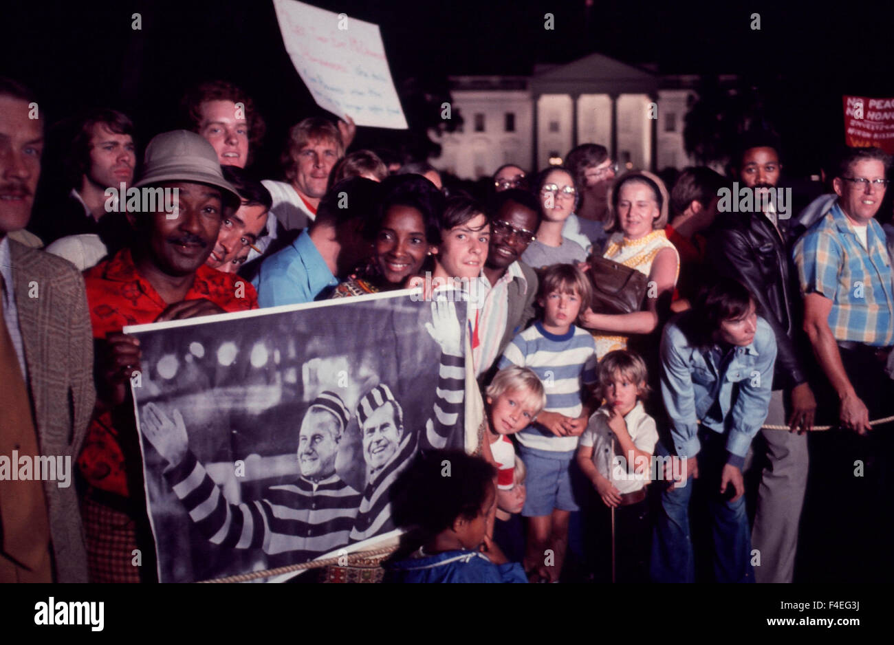 Crowds in Lafayette Park on the night that President Richard Nixon announces that he will resign August 7, 1974. Stock Photo
