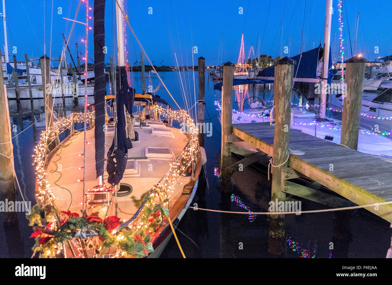 USA, Florida, New Smyrna Beach, boats in marina decorated for Christmas