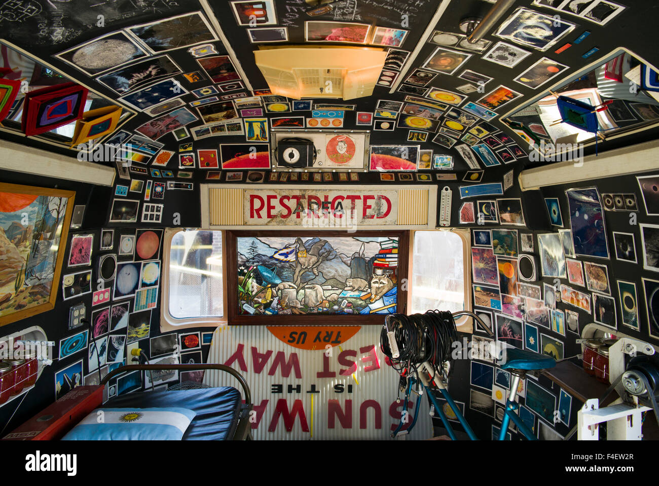 Massachusetts Museum of Contemporary Art, Flying Airstream, 'The Shining', part of 'All Utopias Fell' by artist Michael Oatman, interior with stained glass window Stock Photo