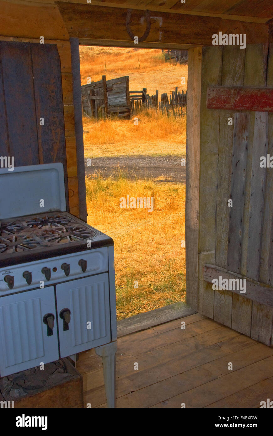 USA, Montana, Missoula. Homestead cabin looking out to prairie. Credit as Nancy Rotenberg