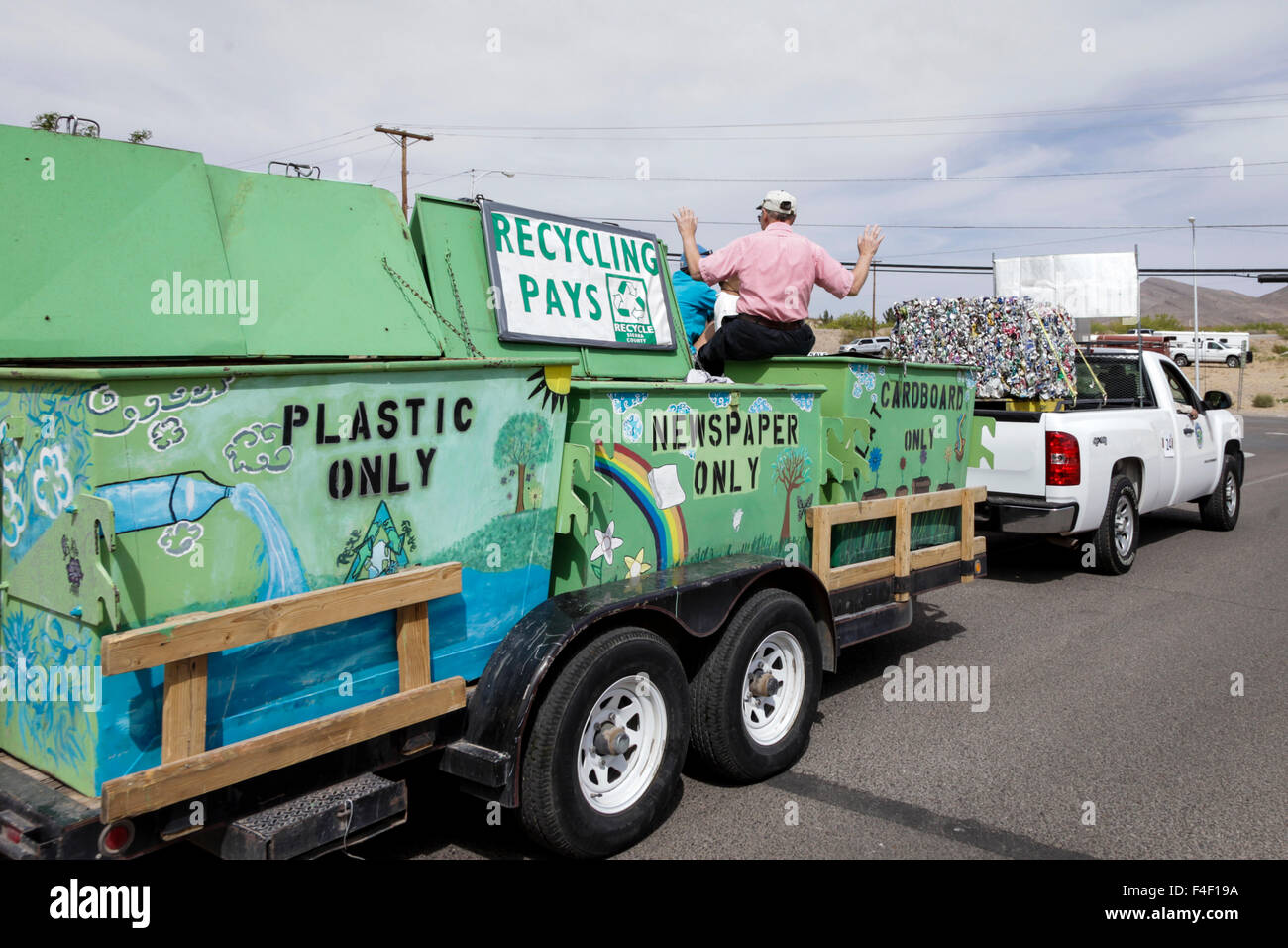 Small town parade float focused on recycling. Truth or Consequences