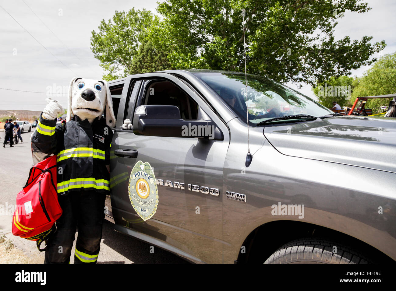 The Fire Department mascot in a small town parade, Truth or