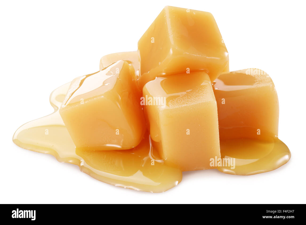 Sweet caramel candies on the white background.Clipping path Stock Photo