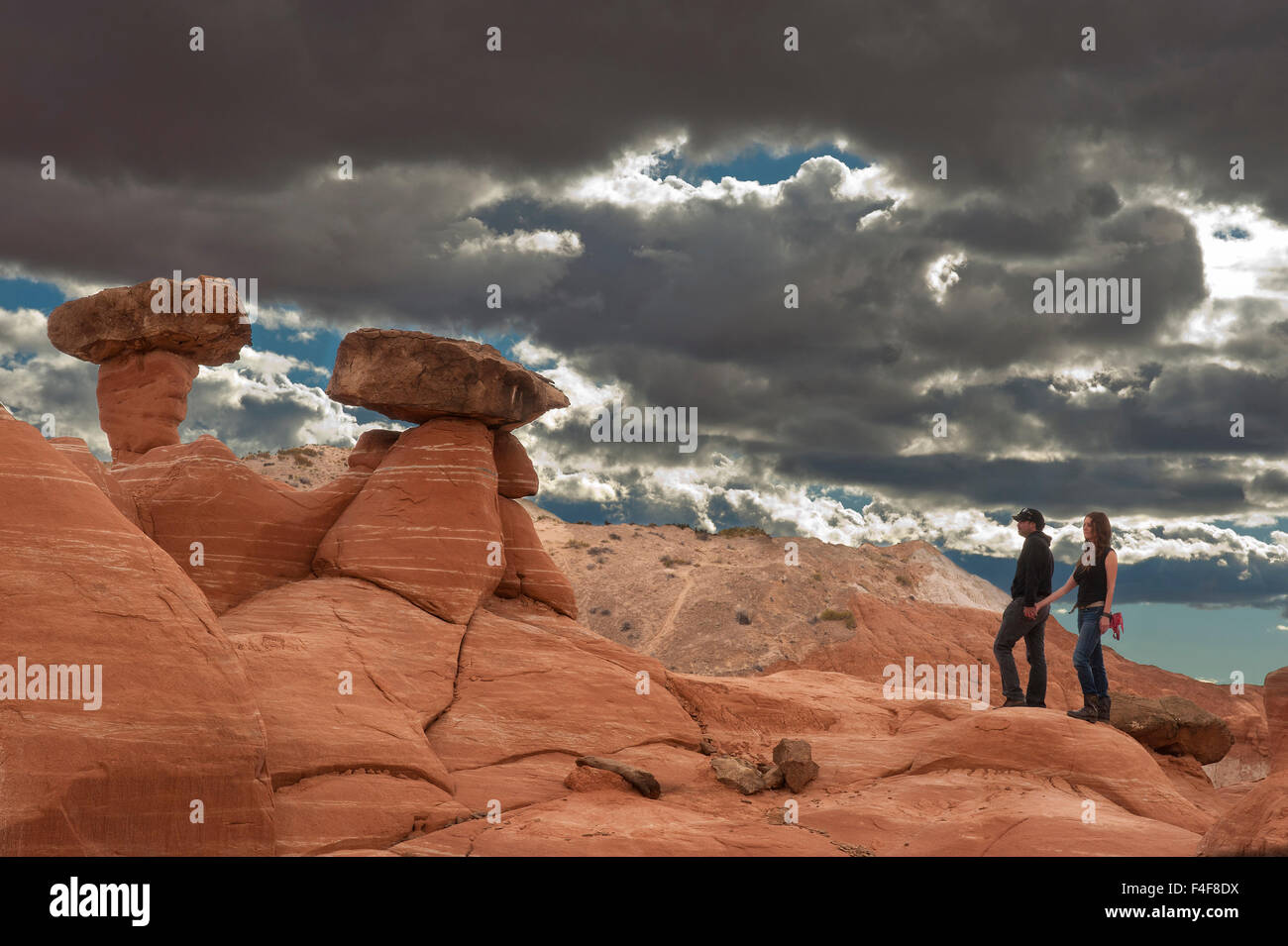 Couple Haven and Jan enjoying view, Toadstool area off Highway 89 near Kanab, Utah and Page Arizona. BLM land, Grand Staircase-Escalante National Monument Stock Photo