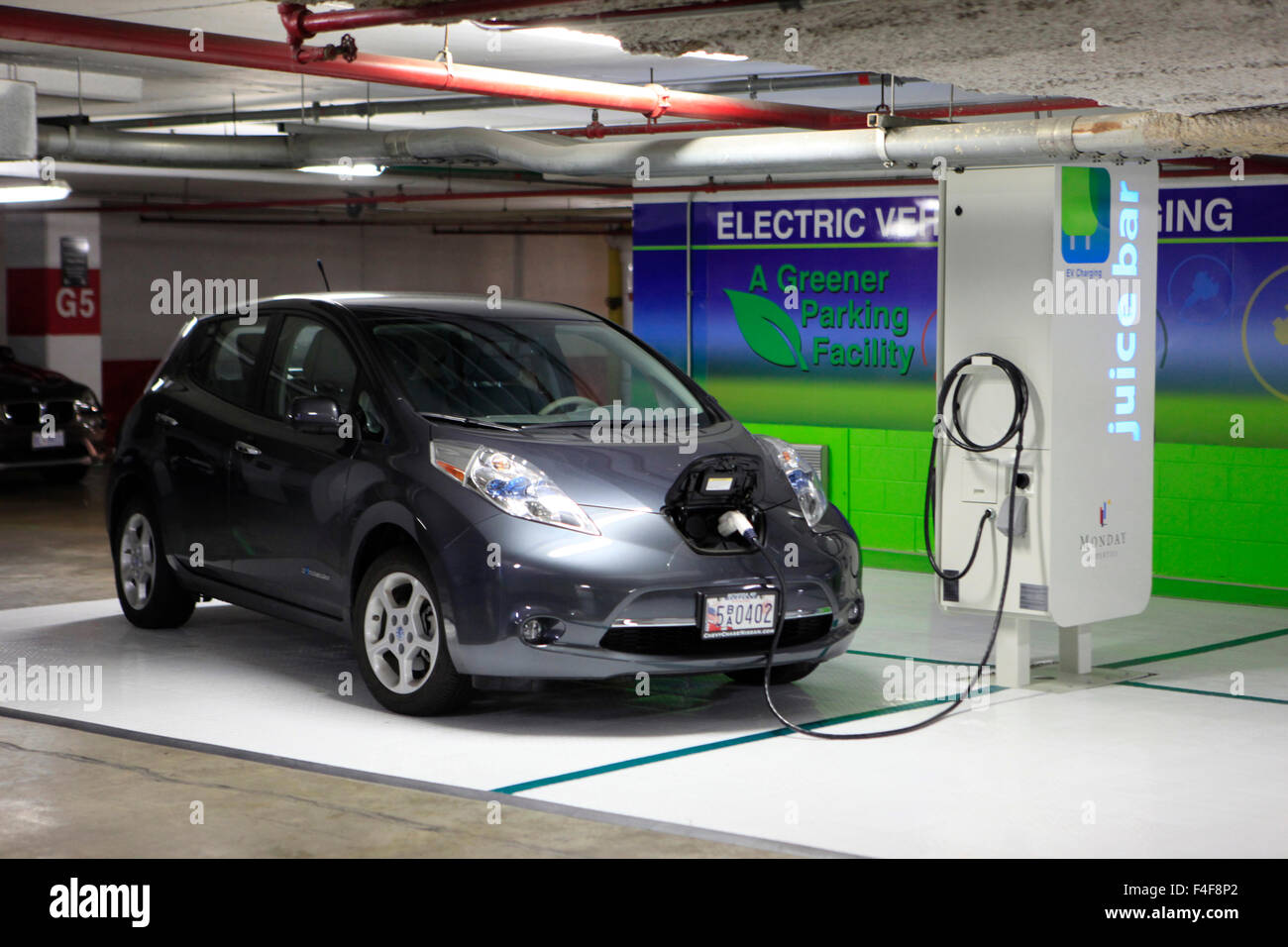 Electric car charging station in a parking garage in Rosslyn, Virginia