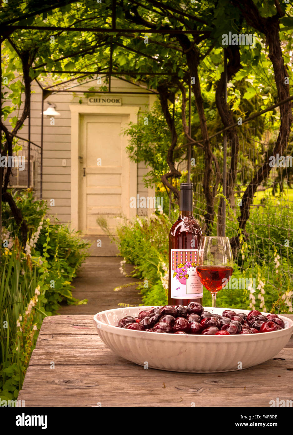 USA, Washington, Prosser. Fresh cherries and red wine from Chinook, an