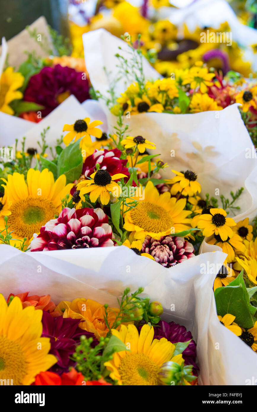USA, Washington State, Seattle, Colorful bouquets at Pike Place Public Market flower stalls. Stock Photo
