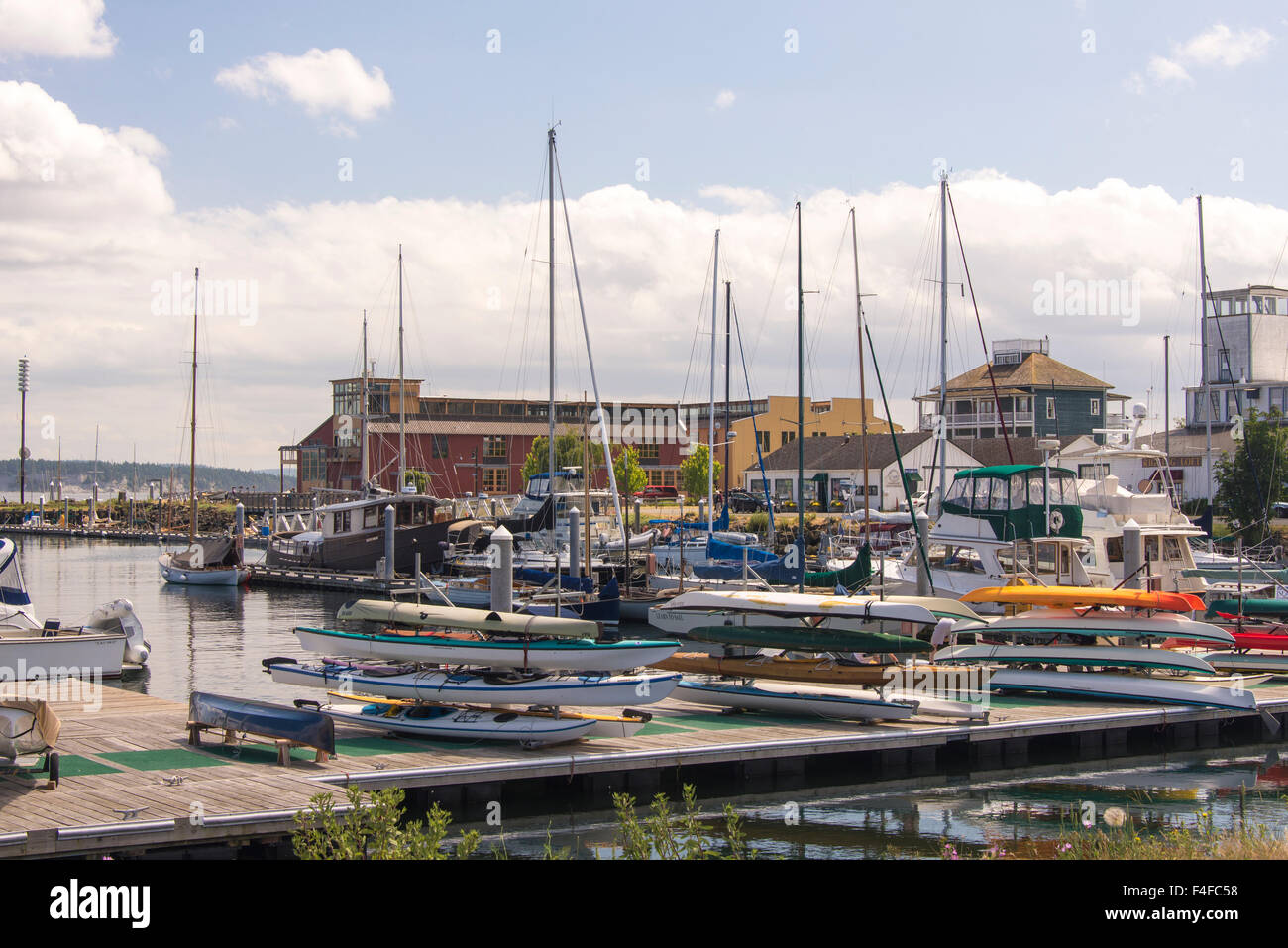 USA, Washington State, Port Townsend. Stacked kayaks ready for rental