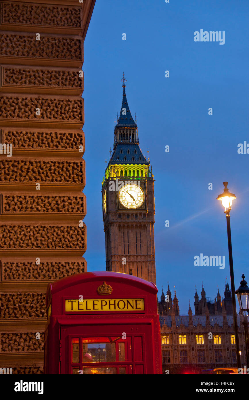 Big Ben clock tower of Houses of Parliament with traditional red K6 telephone box in foreground London England UK Stock Photo