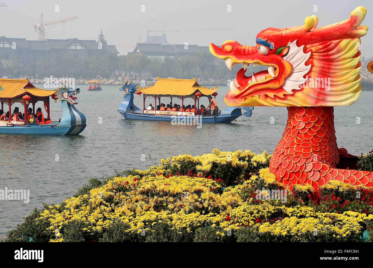 Kaifeng. 17th Oct, 2015. Photo taken on Oct. 17, 2015 shows chrysanthemums displayed in Kaifeng, central China's Henan Province. About 2.05 million pots of chrysanthemum in the city bursted into bloom recently. © Li An/Xinhua/Alamy Live News Stock Photo
