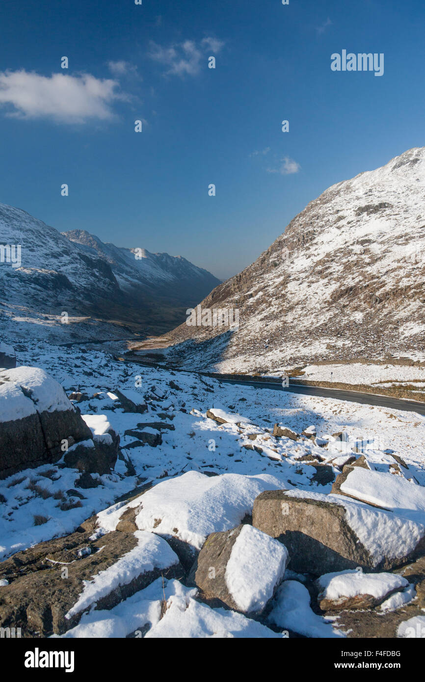 Llanberis Pass A4086 road in winter with snow on road Snowdonia National Park Gwynedd North Wales UK Stock Photo