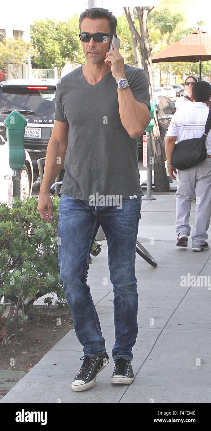 Daniel Bernhardt talks on his cell phone whilst out in Beverly Hills  Featuring: Daniel Bernhardt Where: Los Angeles, California, United States When: 15 Aug 2015 Stock Photo