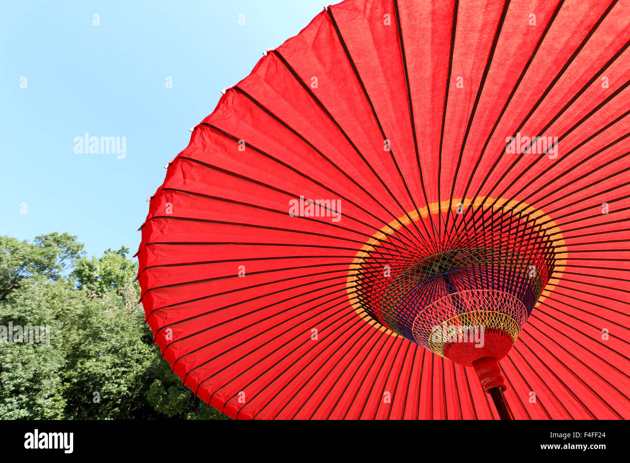 Japanese red umbrella against the blue sky Stock Photo