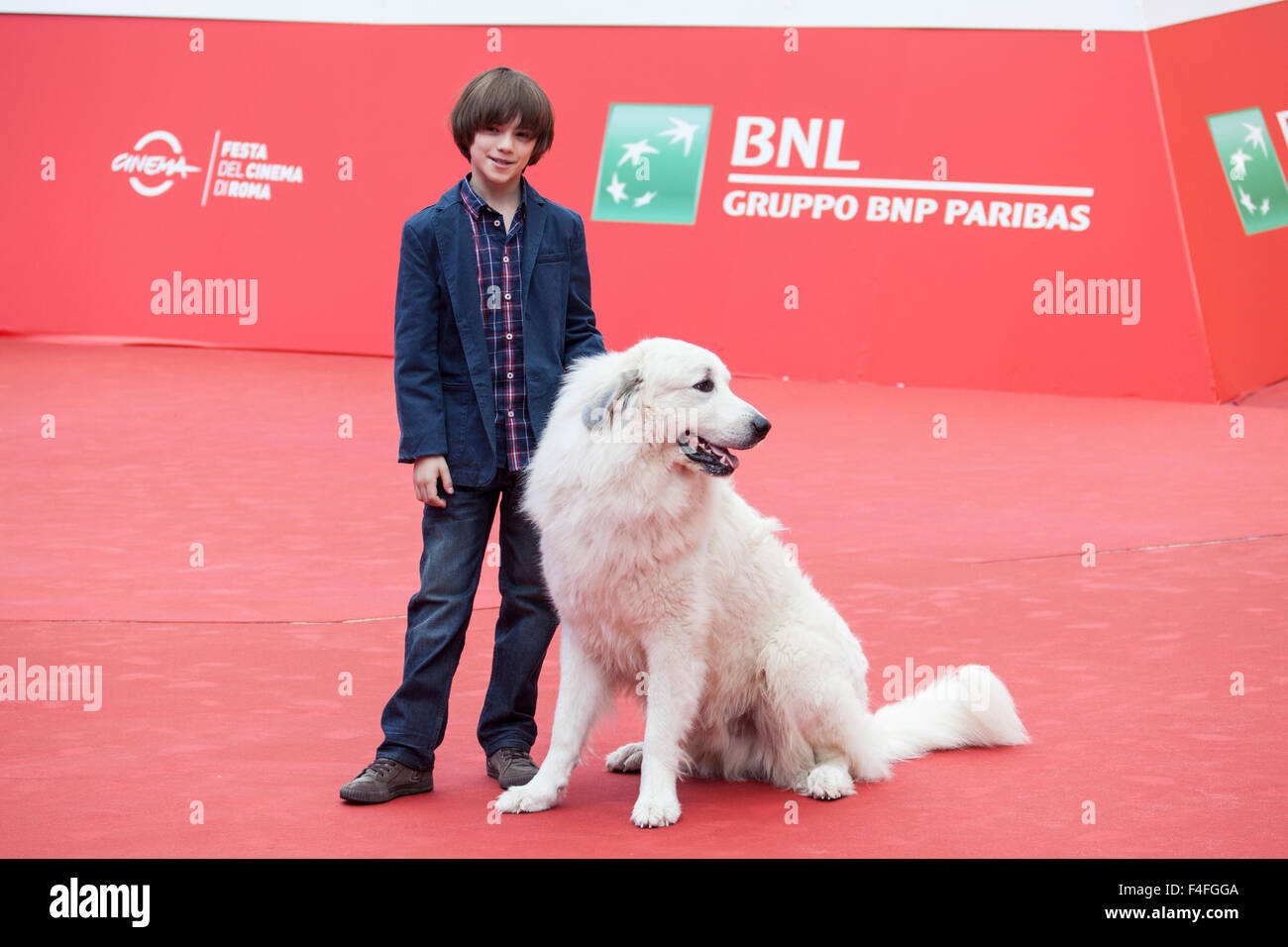 Rome, Italy. 17th October, 2015. Felix Bossuet, and dog Belle on the Red Carpet for the French film 'Belle & Sebastien, The Adventures Continue, at the 10th Rome Film Fest., , Roma, Italy,17/10/15 Credit:  Stephen Bisgrove/Alamy Live News Stock Photo