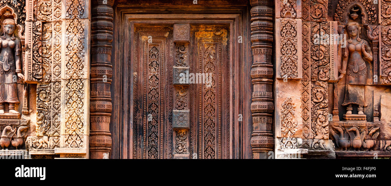 Beautiful blind stone door at Banteay Srei Stock Photo