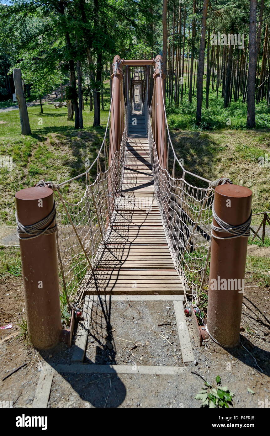 Rope bridge in Prevails Mali town attraction park, Bulgaria Stock Photo