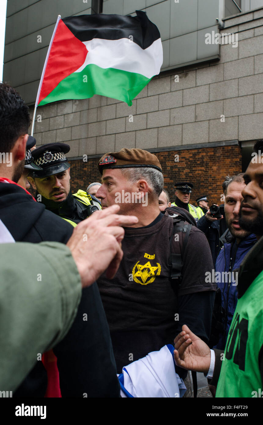 London, UK. 17th October, 2015. A single Israeli protester interrupts the 'Free Palestine' protest, by brandishing an Israeli flag. Credit:  Bertie Oakes/Alamy Live News Stock Photo