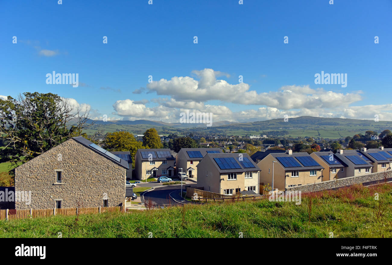 New affordable domestic housing with solar panels on roof. Fir Tree Rise, Kendal, Cumbria, England, United KIngdom, Europe. Stock Photo