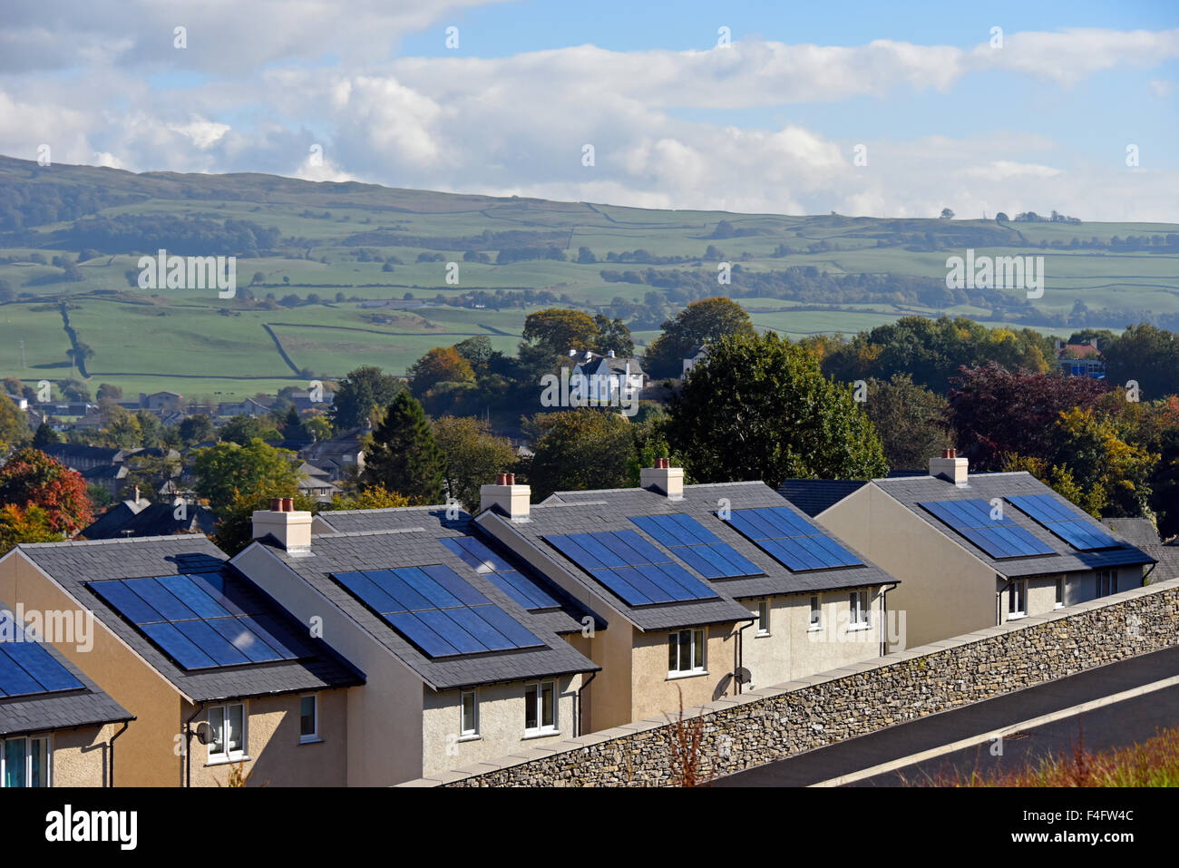 New affordable domestic housing with solar panels on roof. Fir Tree