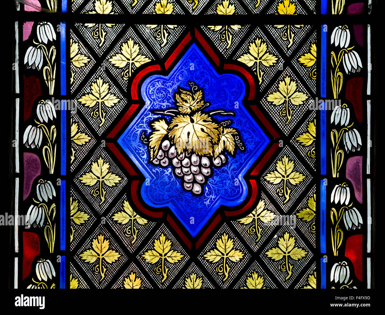 Vine and grapes stained glass in the Church of the Assumption, Beckley