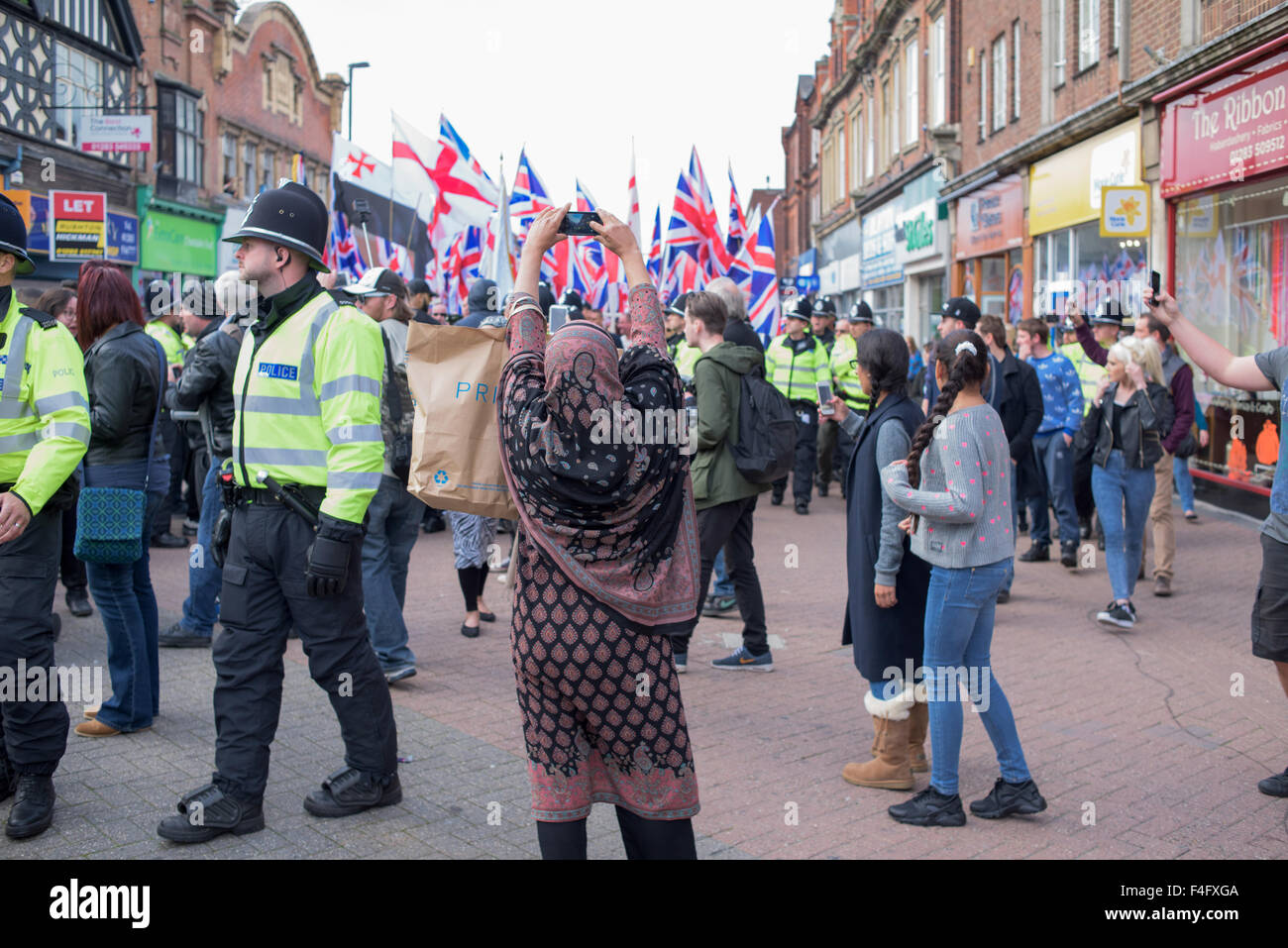 Burton-On-Trent,Staffordshire,UK.17th October 2014.Britain-First far-right  political party held a protest and march through the street of the market  town of Burton,Around three hundred activist took part with counter  demonstration also taking place by