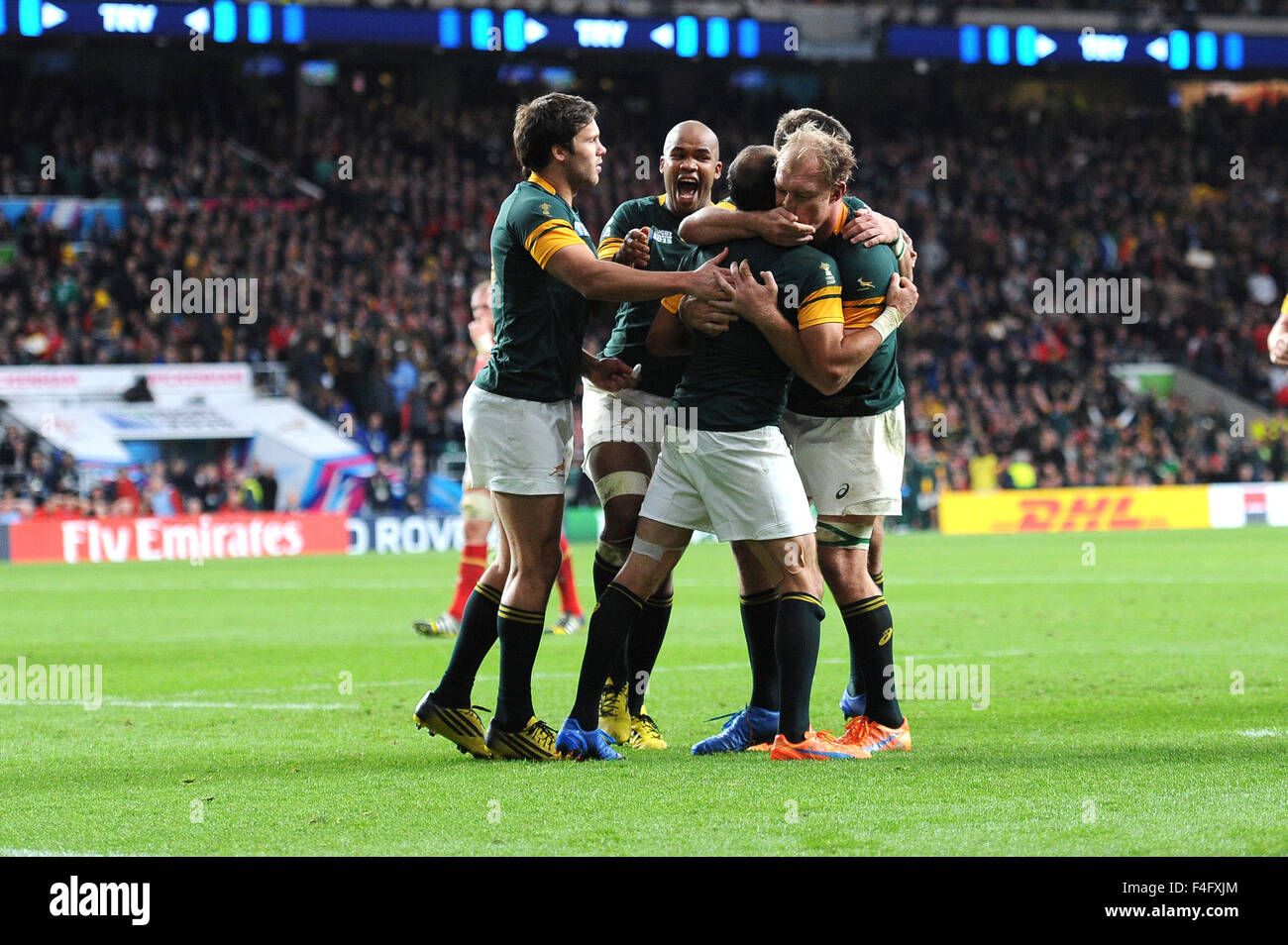 London, UK. 17 October 2015: Boks Captain Fourie du Preez of South Africa is swamped by teammates after scoring a try during the Quarter Final of the Rugby World Cup 2015 between South Africa and Wales - Twickenham Stadium, London.(Photo by: Rob Munro/Stewart Communications/CSM) Credit:  Cal Sport Media/Alamy Live News Stock Photo
