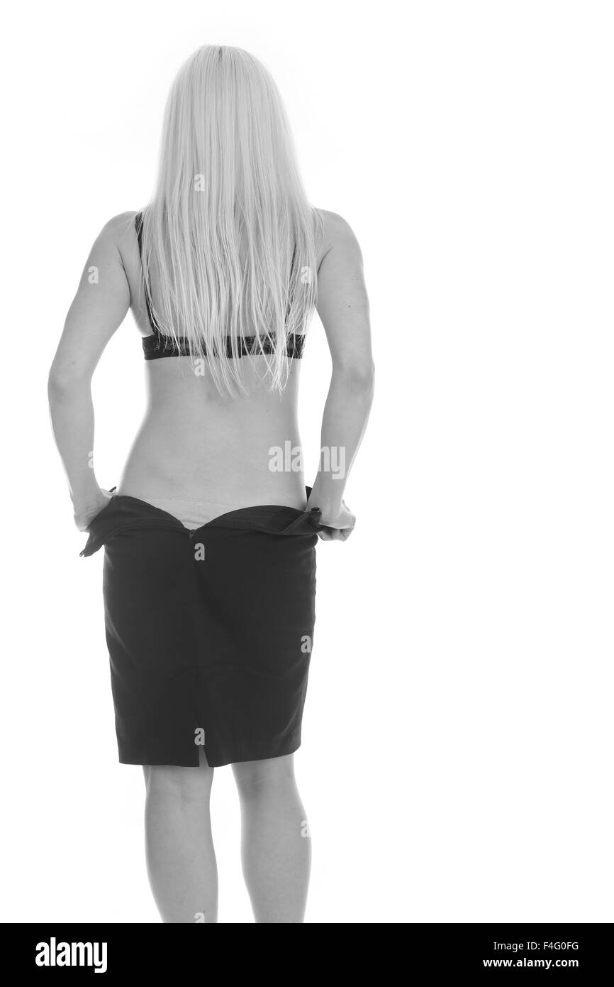 Beautiful Young Blonde Woman Taking Her Skirt Off Stock Photo Alamy